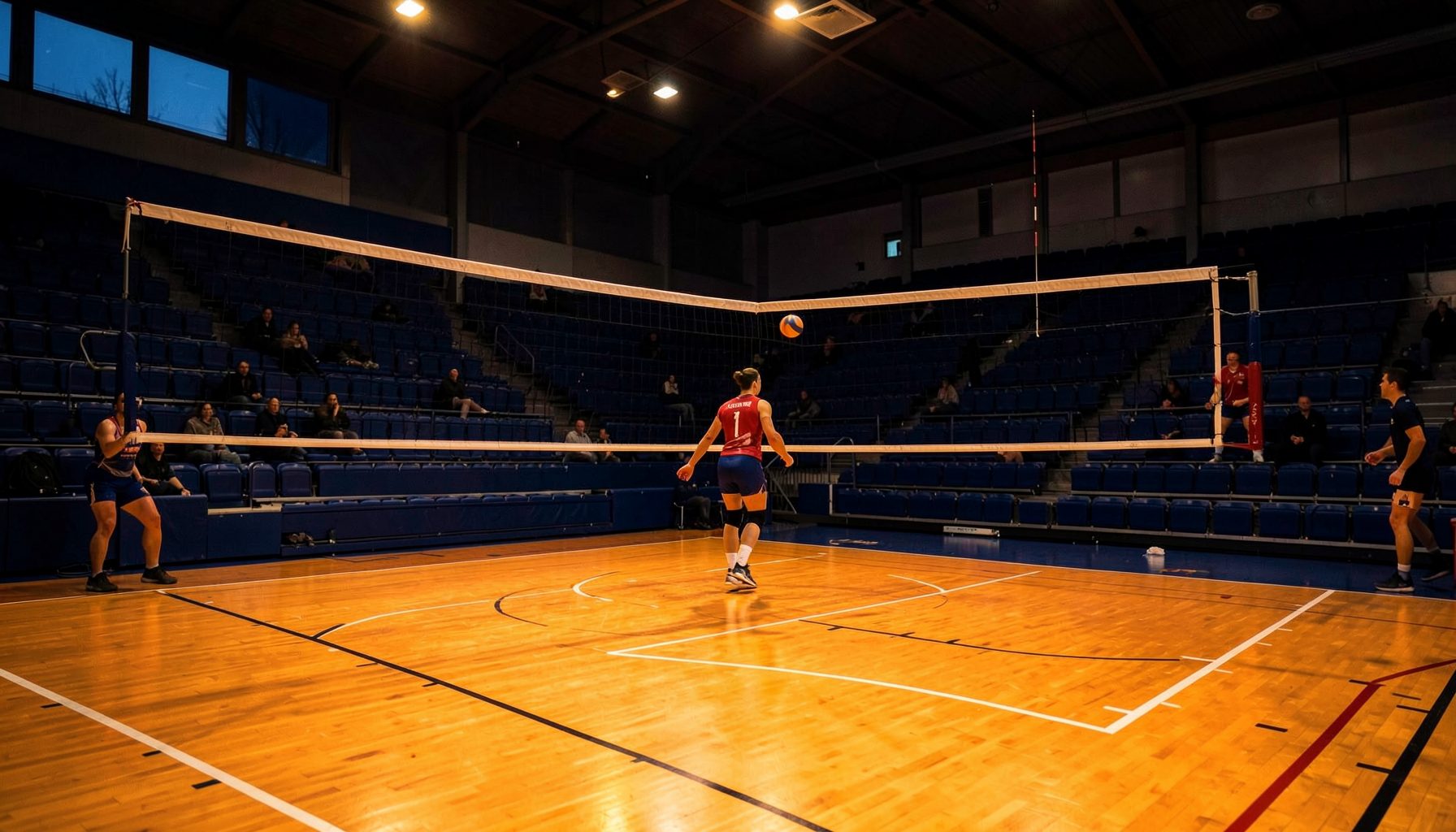 A dramatic indoor volleyball court at dusk, with warm amber court lighting against deep navy bleachers, conveying intensity and athletic atmosphere